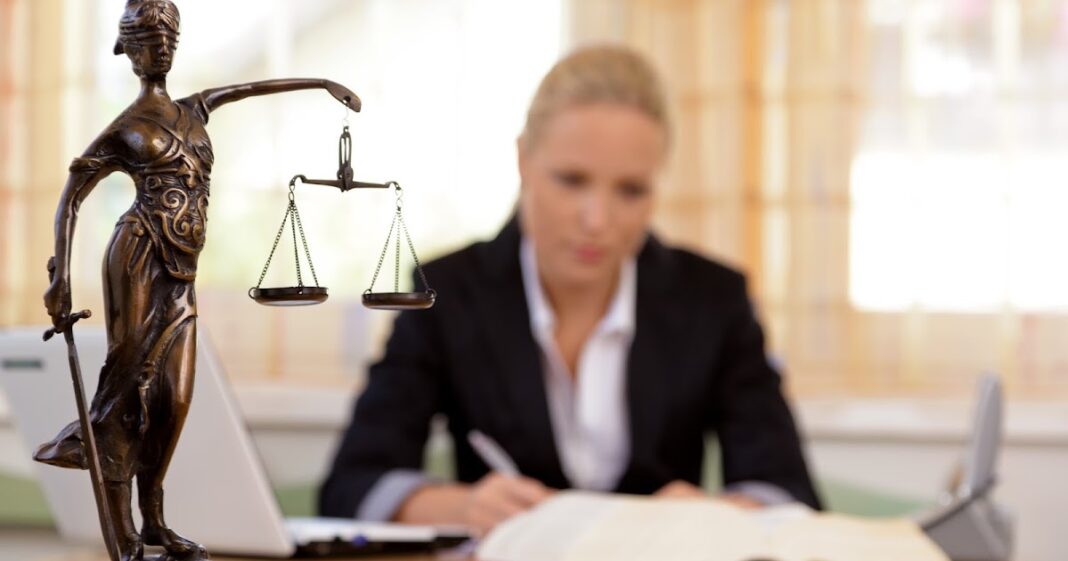 Mesothelioma lawyer consulting client in NYC office
