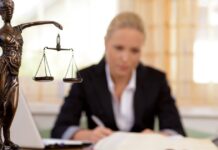 Mesothelioma lawyer consulting client in NYC office